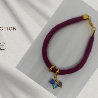 Pulsera con hilo DMC en fucxia.